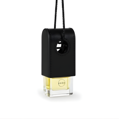Black and clear air freshener with 'KODE' branding on a white background